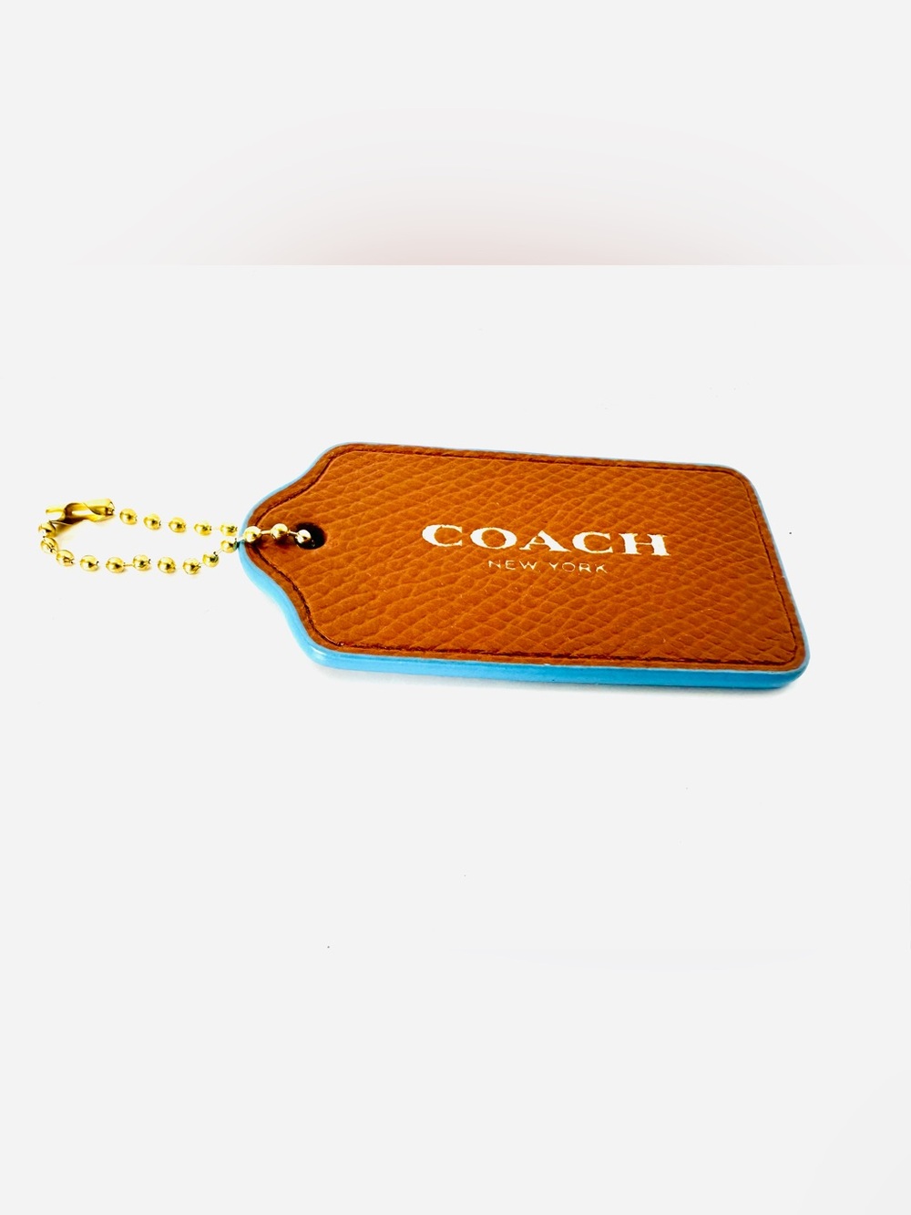 Coach Tan Leather Tag with Bright Blue Trim